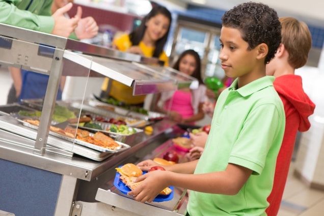 Kids Eating Lunch in a School Cafeteria